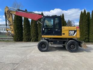 колесный экскаватор CATERPILLAR M 313 D
